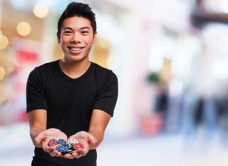 happy man with casino chips