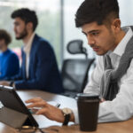 people office analyzing checking finance graphs